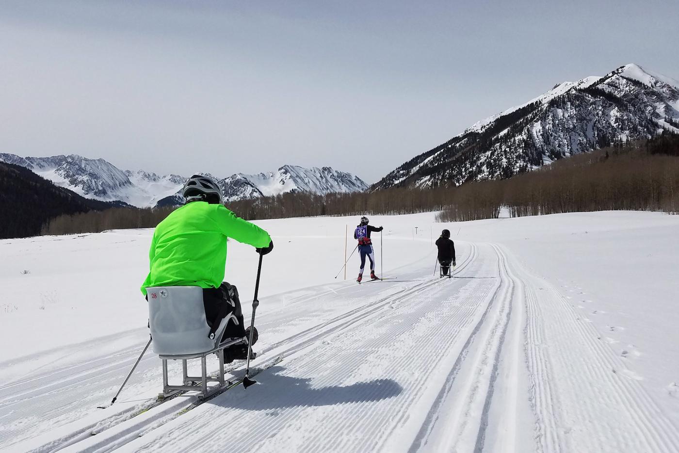 Sit skiers enjoying cross country ski trails in Colorado